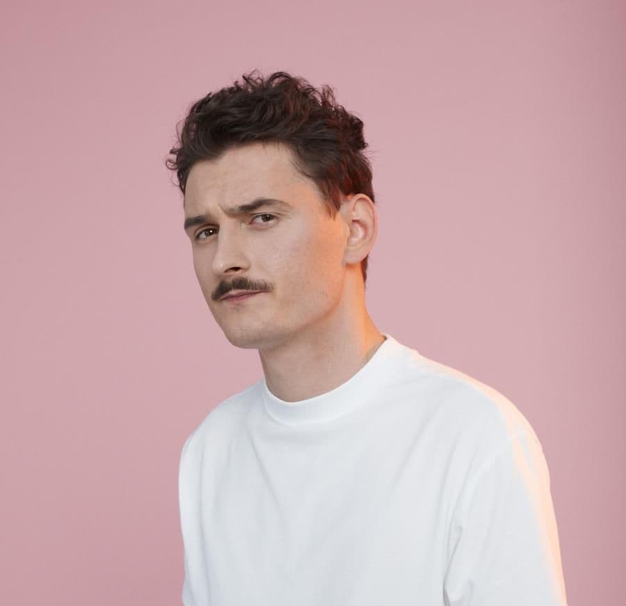 Dawid Podsiadło z Paszportem Polityki na gigantycznym tournee